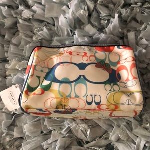 Coach printed make-up bag. NWT!